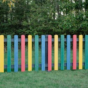 Rainbow Picket Fencing on grass