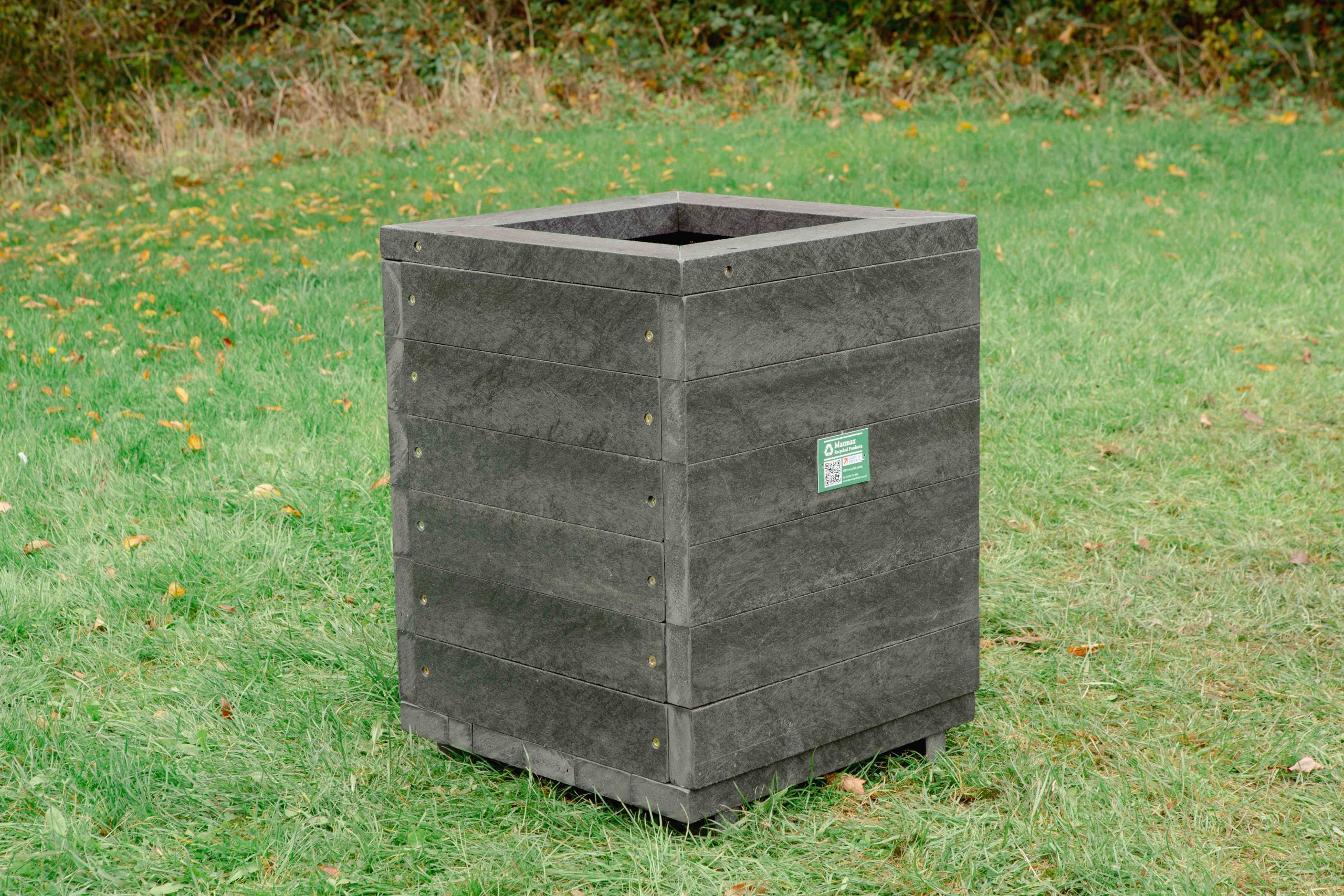 Large black Planter on grass