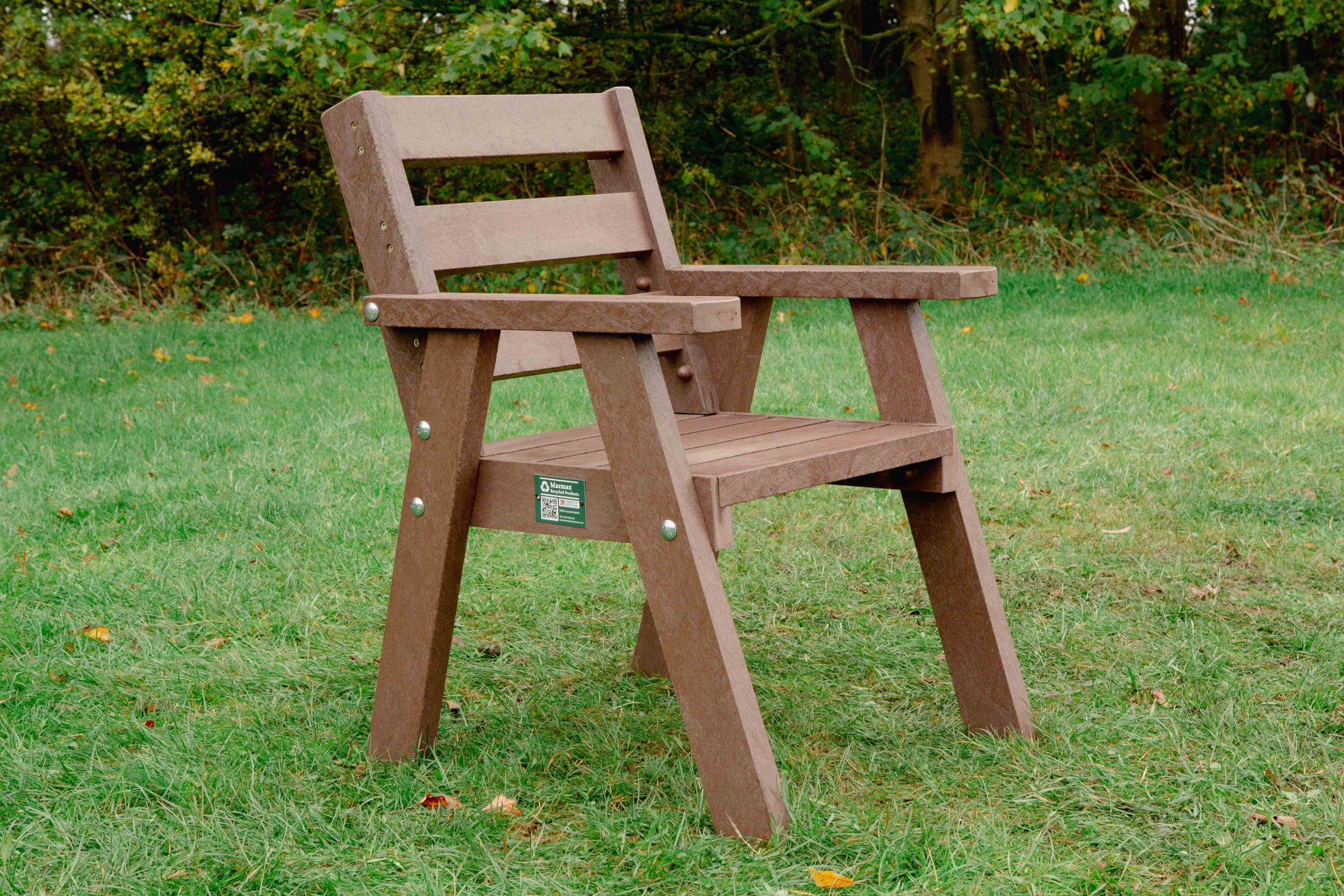 Brown Sloper Chair on grass