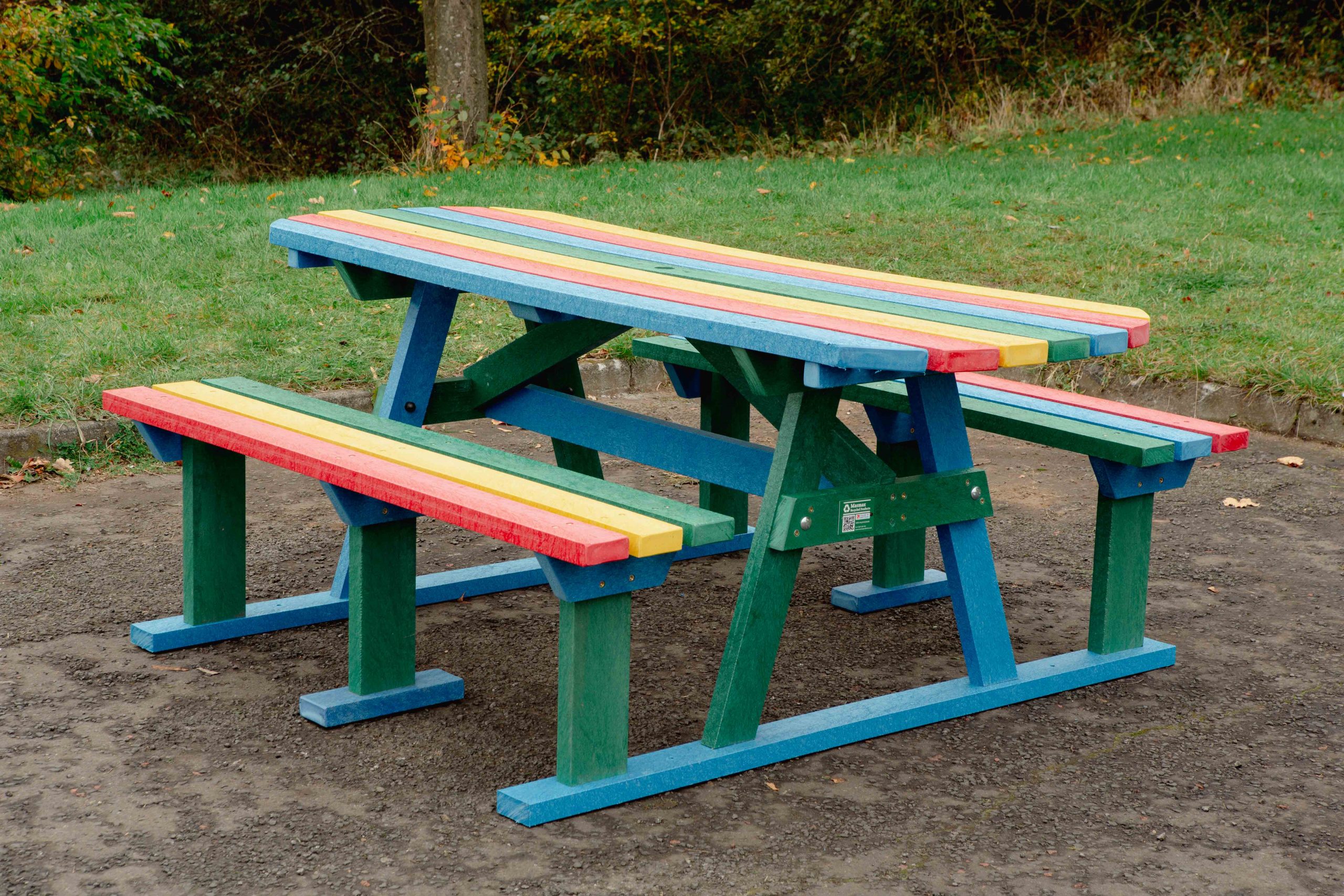 Rainbow Sturdy Picnic Bench with extended top on grass